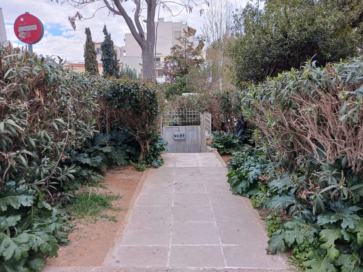 Underground public restroom entrance on Dionysiou Areopagitou in Athens