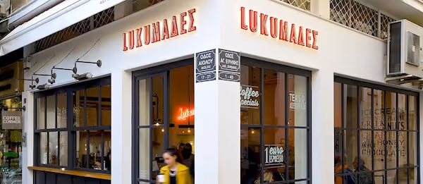 Lukumades shop on Aiolou Street in Monastiraki — Greek honey doughnuts