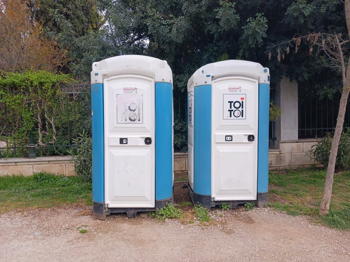 Portable public toilets outside the National Garden in Athens